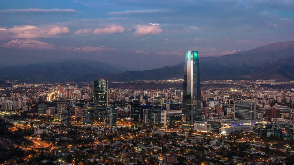 Night Time Aerial View Of The City Including The Torre Santiago (tallest Building In South America, 300m), From Cerro San Cristobal Of Santiago, Chile