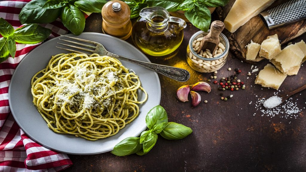 Pasta Al Pesto Plate On Dark Kitchen Table